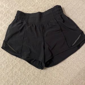 black Lululemon high rise hotty hot shorts